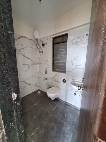 Bathroom in 2 BHK Apartment at Raunak City, Kalyan West – for Rent