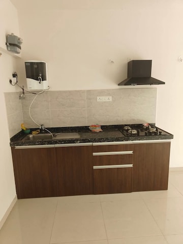 Kitchen in Studio Apartment at Gera World of Joy, Kharadi – for Rent