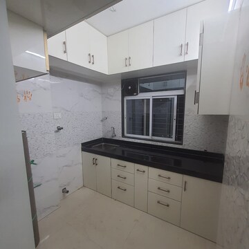 Kitchen in 2 BHK Apartment at Hirani Samruddhi Elegance, Kurla East – for Rent