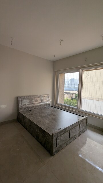 Room in 2 BHK Apartment at Pratham Saffron Heights, Andheri West – for Rent