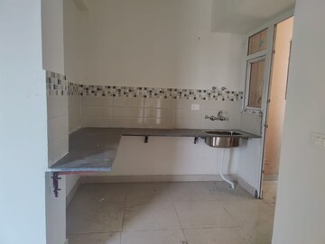Kitchen in 2 BHK Apartment at Signature Global Orchard Avenue, Sector 93 – for Rent