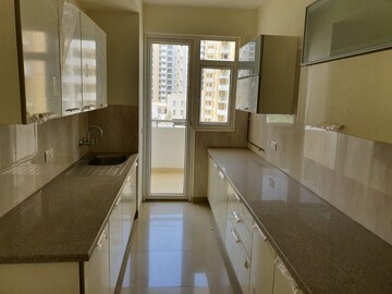 Kitchen in 3.5 BHK Apartment at Emaar Imperial Gardens, Sector 102 – for Sale