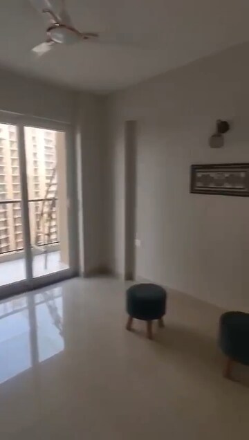 Living Room in 2 BHK Apartment at Tata Eureka Park, Sector 150 – for Rent