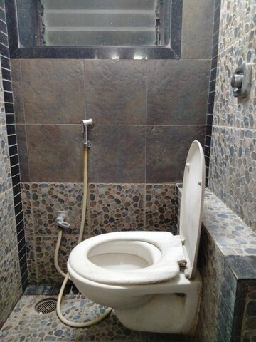 Bathroom in 1 BHK Apartment at Sai Crystal Empire, Nalasopara East – for Rent