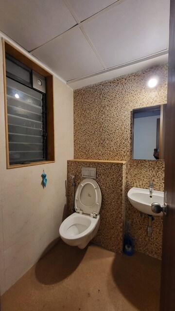 Bathroom in 2 BHK Apartment at Lodha Lakeshore Greens, Dombivli East – for Rent