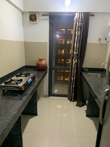 Kitchen in 1 BHK Apartment at Lodha Palava City Lakeshore Greens, Dombivli East – for Rent