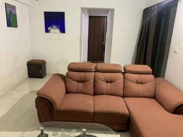 Living Room in 1 BHK Apartment at Lodha Palava City Lakeshore Greens, Dombivli East – for Rent