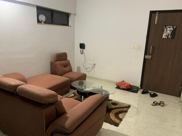 Living Room in 1 BHK Apartment at Lodha Palava City Lakeshore Greens, Dombivli East – for Rent