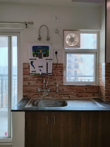 Kitchen in 2 BHK Apartment at Amrapali Leisure Park, Amrapali Leisure Valley – for Sale