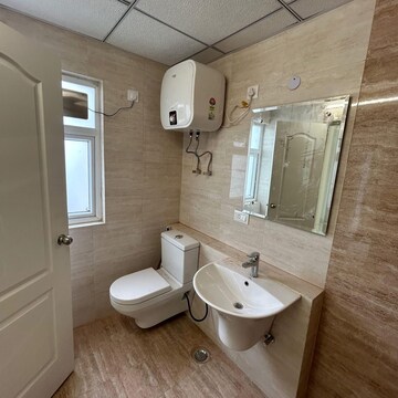 Bathroom in 3 BHK Apartment at Godrej Meridien, Mohammad Heri Village – for Rent