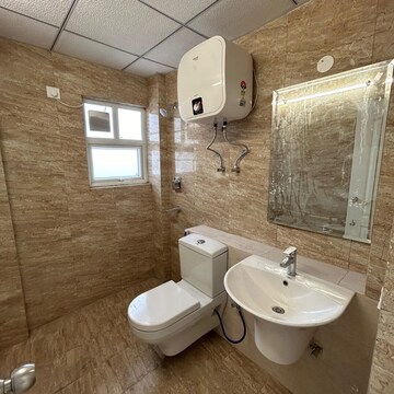 Bathroom in 3 BHK Apartment at Godrej Meridien, Mohammad Heri Village – for Rent