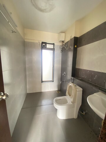 Bathroom in 3 BHK Apartment at Acme Ozone Phase II, Manpada – for Rent