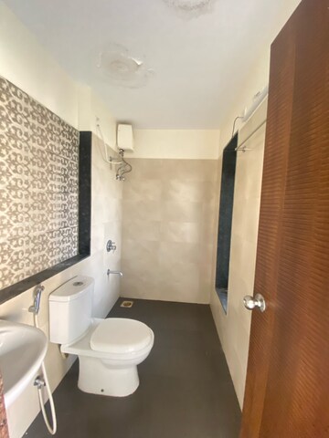 Bathroom in 3 BHK Apartment at Acme Ozone Phase II, Manpada – for Rent