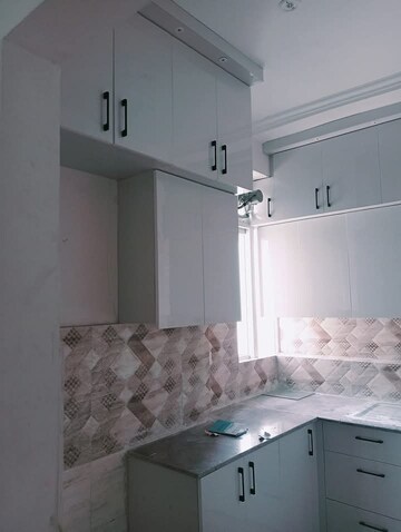 Kitchen in 2 BHK Apartment at Amrapali Golf Homes, Sector 4, Greater Noida – for Sale