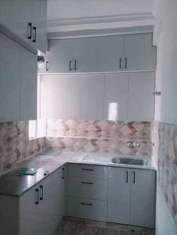 Kitchen in 2 BHK Apartment at Amrapali Golf Homes, Sector 4, Greater Noida – for Sale