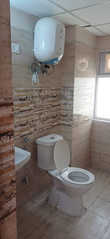 Bathroom in 3 BHK Apartment at Amrapali Golf Homes, Sector 4, Greater Noida – for Sale