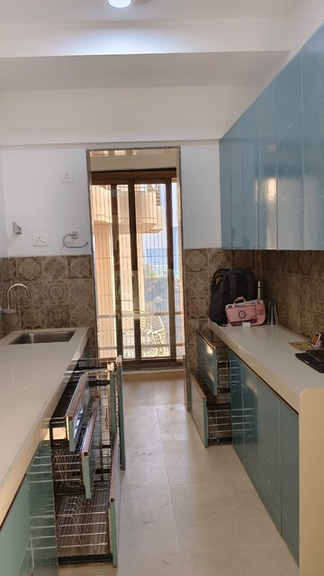 Kitchen in 2 BHK Apartment at Castle Rock, Powai – for Rent