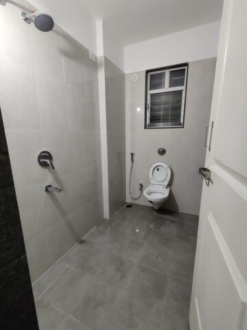 Bathroom in 2 BHK Apartment at Nirman Royale Vision, Ravet – for Rent