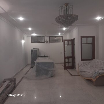 Living Room in 4 BHK Apartment at Greater Kailash ii – for Sale