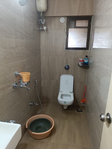 Bathroom in 2 BHK Apartment at Cosmos Jewels, Ghodbunder Road – for Rent