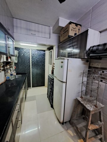 Team Area in 1 BHK Apartment at Amrut CHS, Tilak Nagar – for Rent