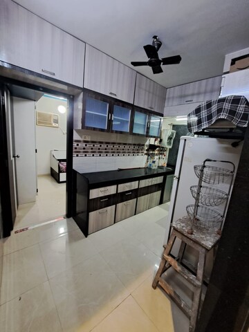 Team Area in 1 BHK Apartment at Amrut CHS, Tilak Nagar – for Rent