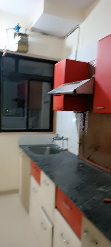 Kitchen in 1 BHK Apartment at Puranik Hometown, Ghodbunder Road – for Rent