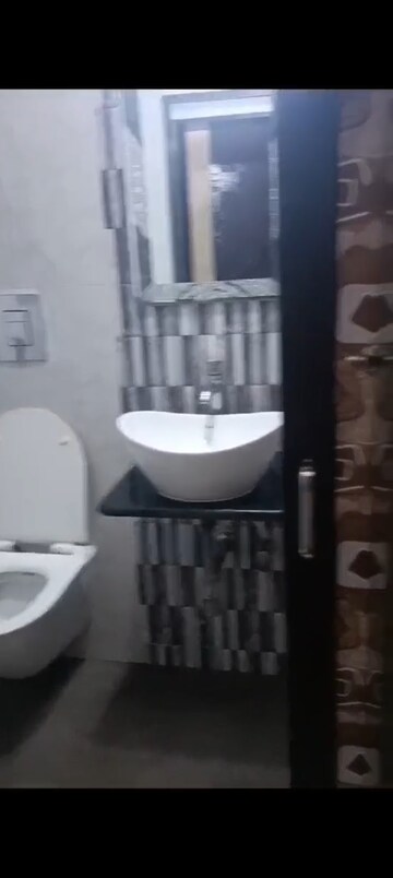 Bathroom in 2 BHK Apartment at Dheeraj Kirti, Malad West – for Rent