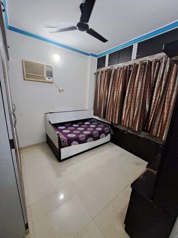 Bedroom in 1 BHK Apartment at Tilak Nagar Building, Tilak Nagar – for Rent