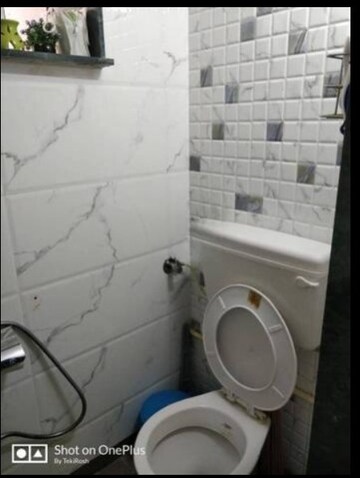 Bathroom in 1 BHK Apartment at Sarkar Corner CHS, Andheri West – for Rent
