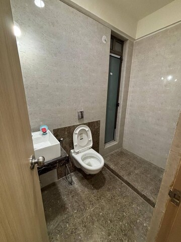Bathroom in 2 BHK Apartment at Abrol Signature, Malad West – for Rent