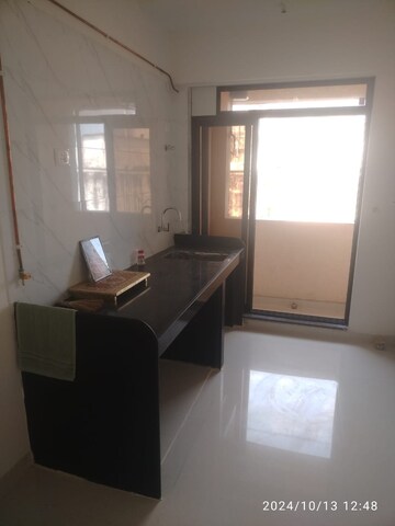 Kitchen in 2 BHK Apartment at Datta Tower Thane, Naupada – for Sale