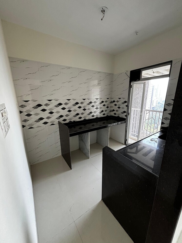 Kitchen, jvm-veda 2 Bedroom 601 Sq.Ft. Apartment In Kasarvadavali Thane 8069164