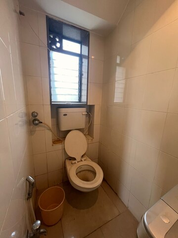 Bathroom in 2 BHK Apartment at Peninsula Salsette 27, Byculla – for Rent