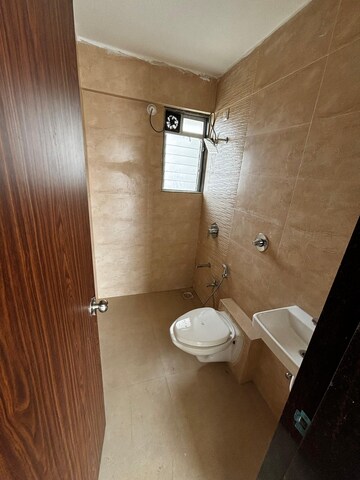 Bathroom in 1 BHK Apartment at Vihang Valley Phase 3, Kasarvadavali – for Rent
