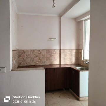 Kitchen in 2 BHK Apartment at Amrapali Golf Homes, Sector 4, Greater Noida – for Rent