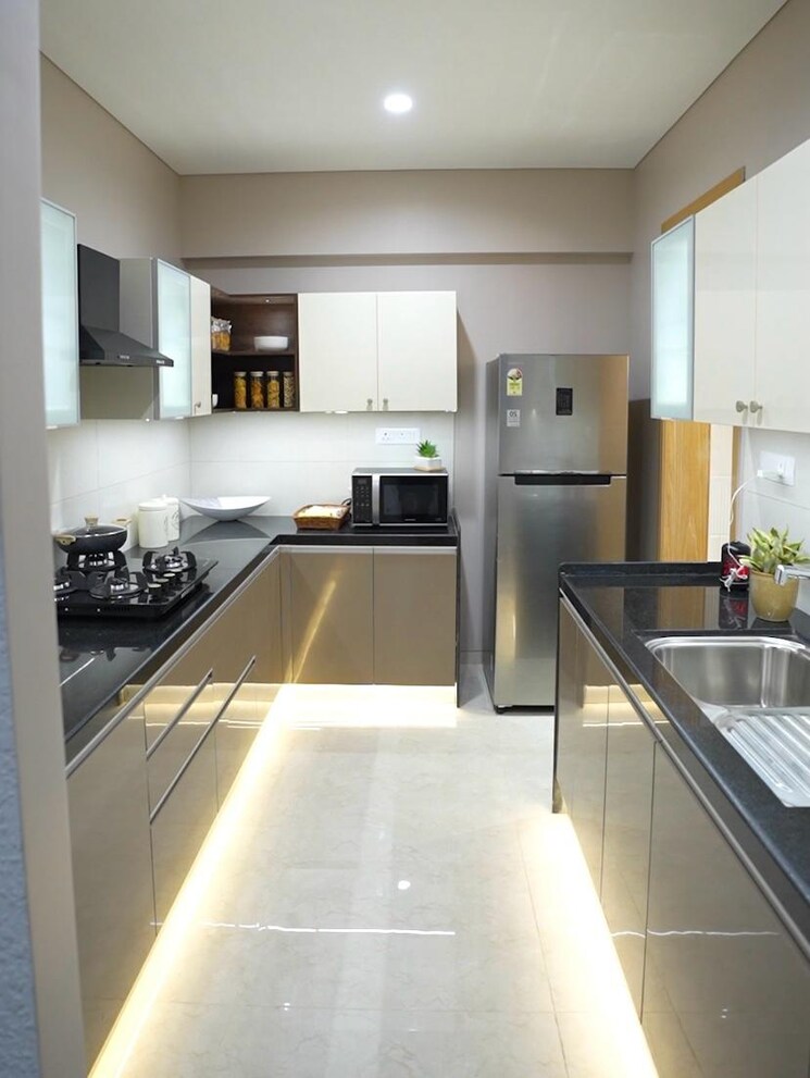 Kitchen, gera-joy-on-the-tree-tops 3 Bedroom 1011 Sq.Ft. Apartment In Hinjewadi Pune 8069263