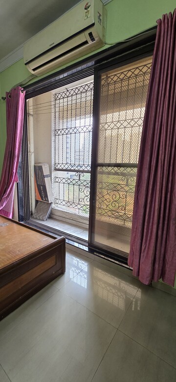 Room in 2 BHK Apartment at Shree Ambika Complex, Ghansoli – for Rent