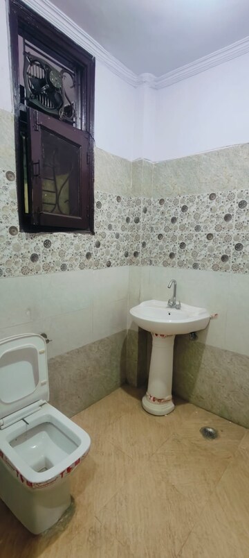 Bathroom in 3 BHK Builder Floor at Soho Apartments, Shakti Khand – for Sale