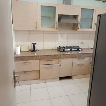 Kitchen in 4 BHK Apartment at ATS Triumph, Dhanwapur – for Rent