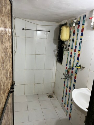 Bathroom in 1 BHK Apartment at RNA NG Paradise, Mira Road – for Rent