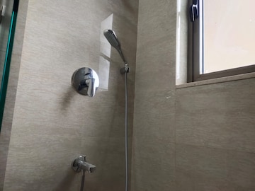 Bathroom in 1 BHK Apartment at Omkar Signet, Malad East – for Rent