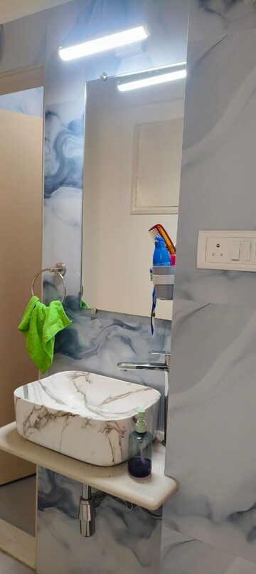 Bathroom in 1 BHK Apartment at Hiranandani Gardens Canna, Powai – for Rent