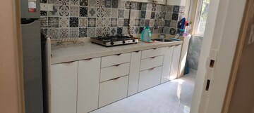 Kitchen in 1 BHK Apartment at Hiranandani Gardens Canna, Powai – for Rent