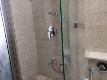 Bathroom in 1 BHK Apartment at Omkar Signet, Malad East – for Rent