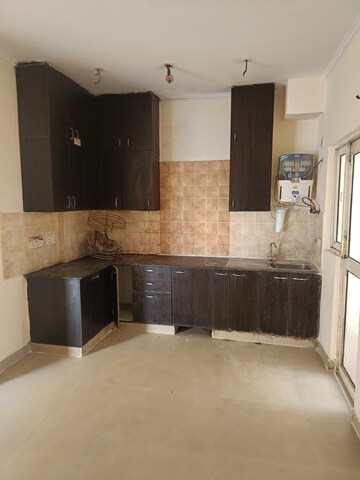 Kitchen in 3 BHK Apartment at Gardenia Golf City, Sector 75 – for Rent