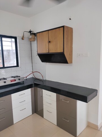 Kitchen in 2 BHK Apartment at Suyog Sankul, Aundh – for Rent