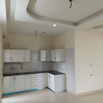 Kitchen in 3 BHK Apartment at Sikka Kaamna Greens, Sector 143 – for Rent