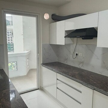 Kitchen in 2 BHK Apartment at Tata Eureka Park Phase 2, Sector 150 – for Rent