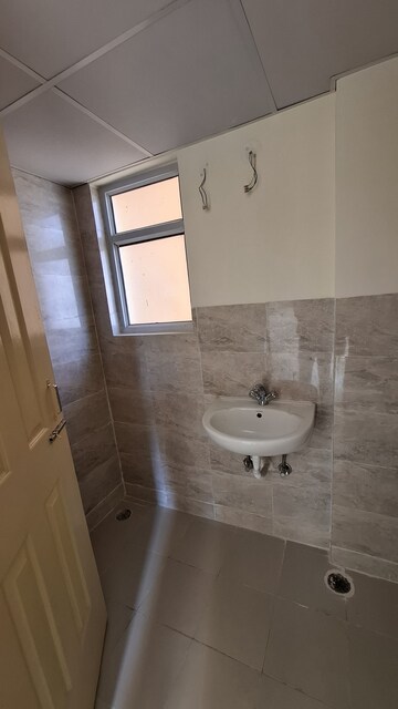 Bathroom in 2 BHK Apartment at Wave City – for Sale